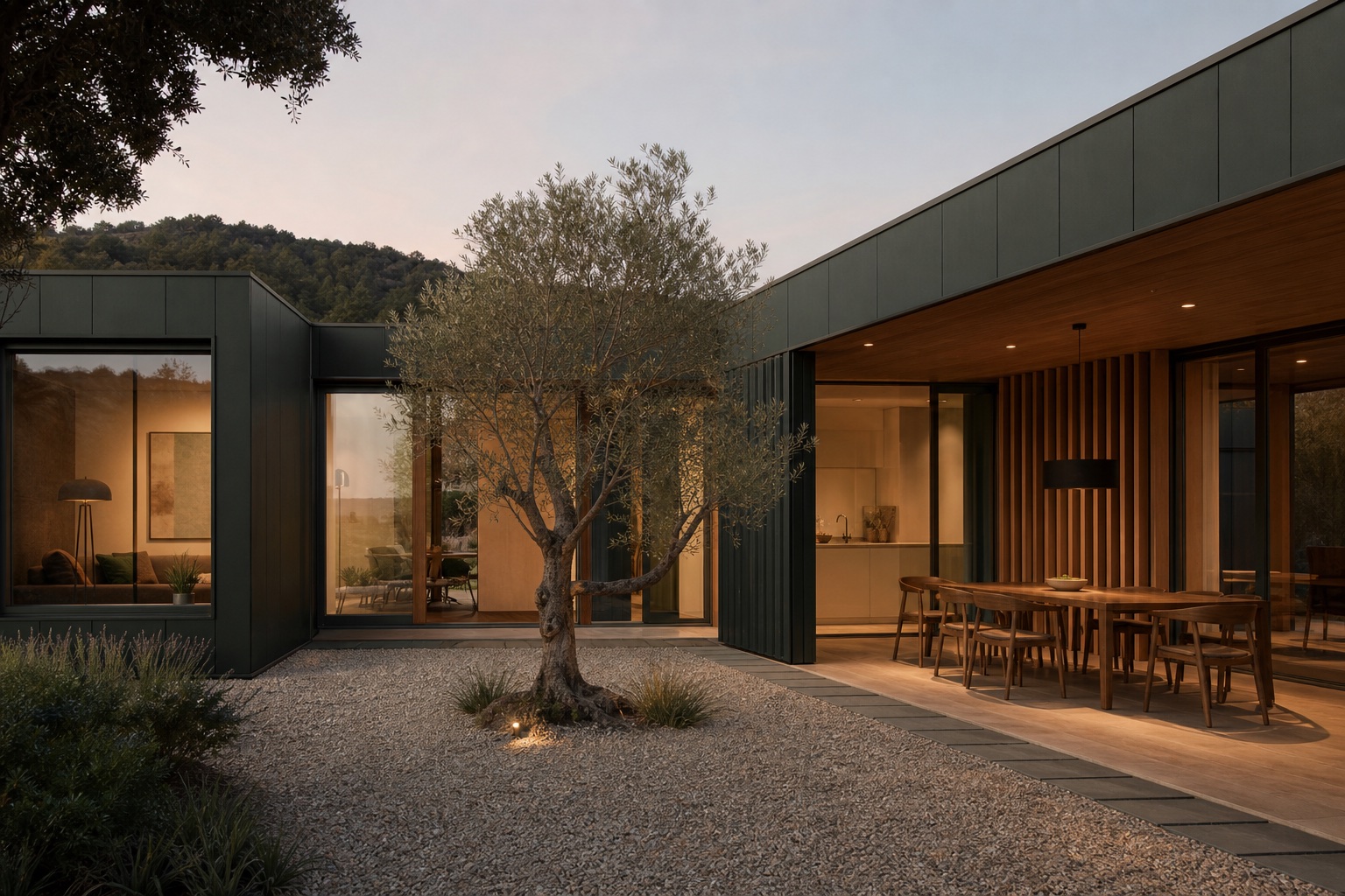 Completed green modular courtyard home with an olive tree